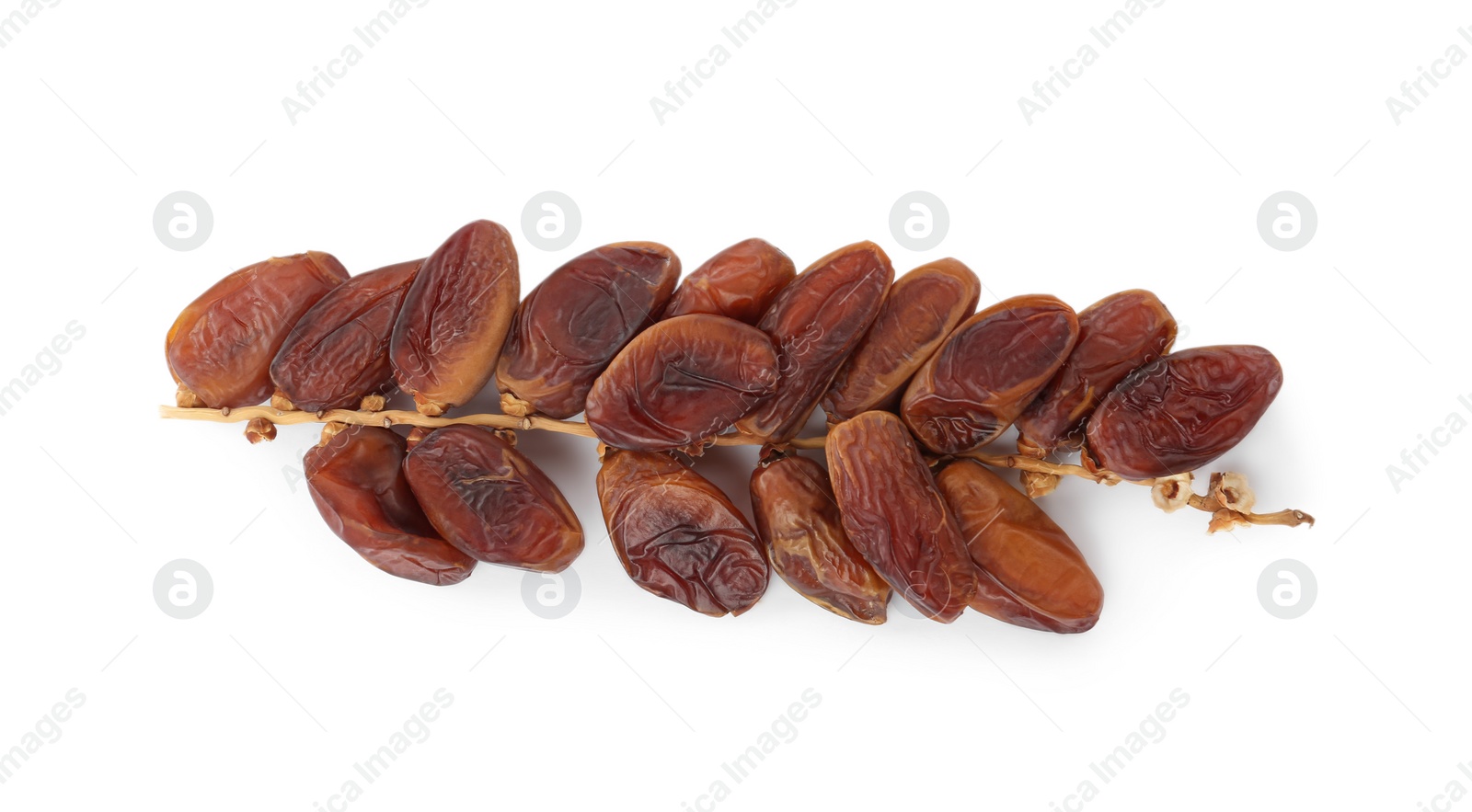 Photo of Sweet dates on branch against white background, top view. Dried fruit as healthy snack