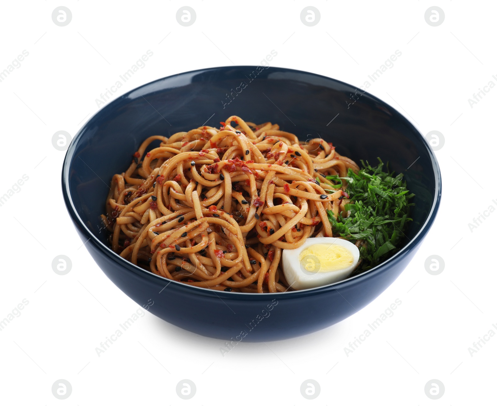 Photo of Bowl of noodles with spices and egg isolated on white