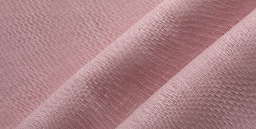 Texture of pink fabric as background, top view