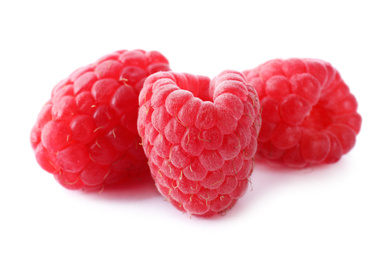 Photo of Delicious fresh ripe raspberries isolated on white