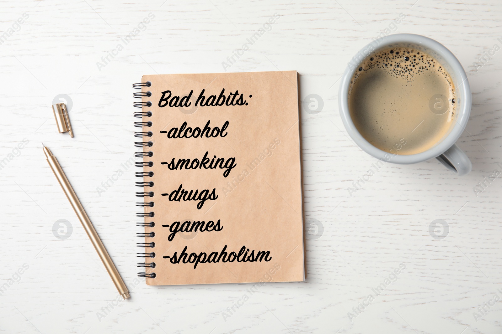 Image of Notebook with list of bad habits and cup of coffee on white wooden table, flat lay