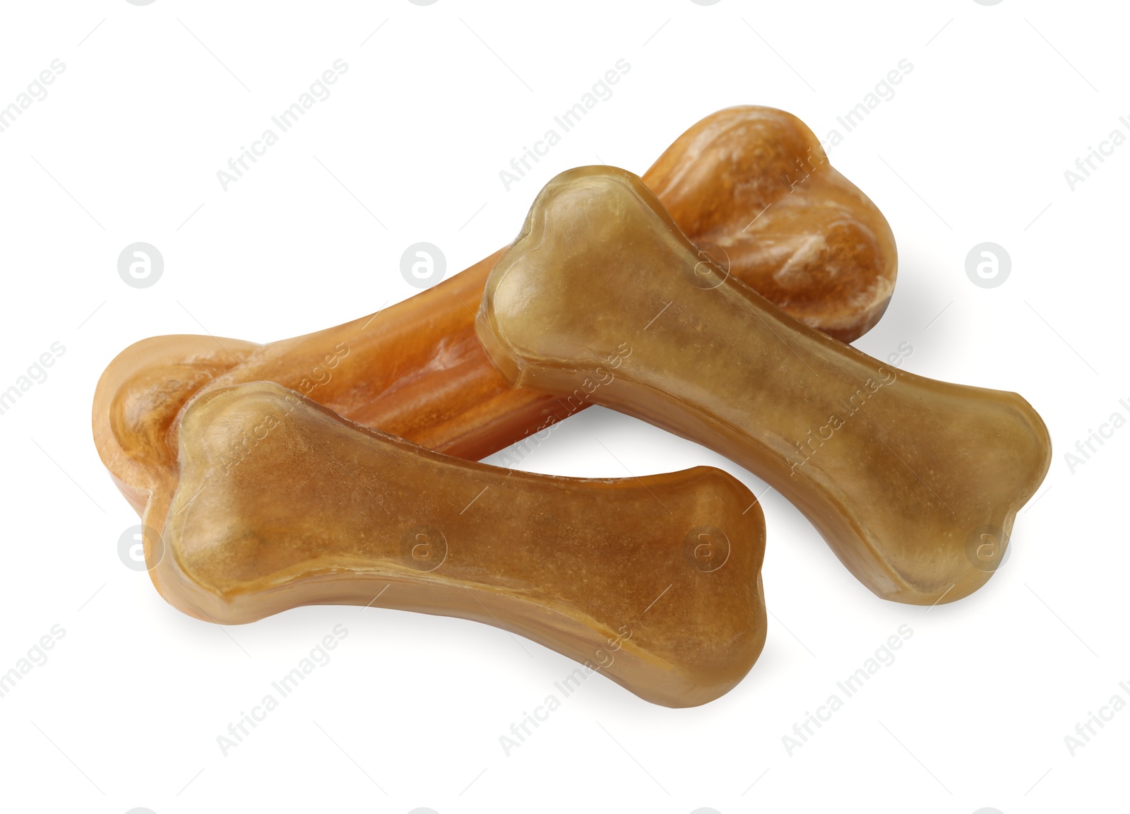 Photo of Chew bones for dog isolated on white. Pet toys