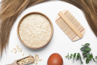 Flat lay composition with homemade hair mask and ingredients on white background