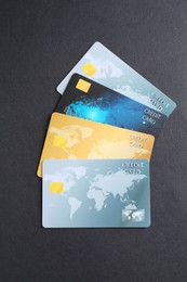 Photo of Many credit cards on grey table, flat lay