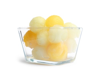 Photo of Glass bowl of melon balls on white background