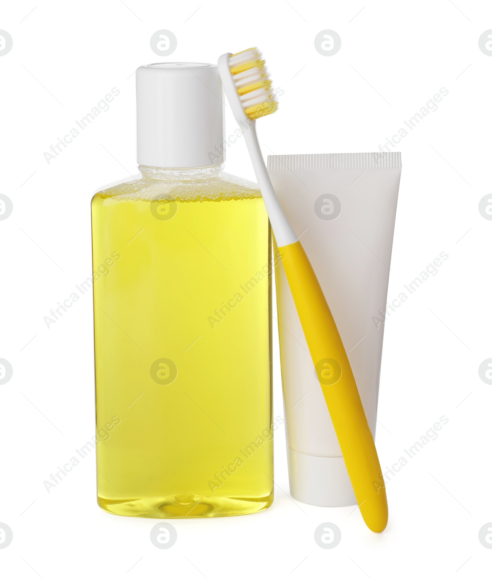 Photo of Mouthwash, toothbrush and toothpaste isolated on white