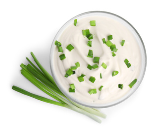 Fresh sour cream with onion on white background, top view