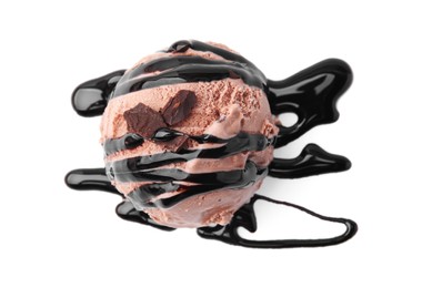 Photo of Scoop of tasty ice cream with chocolate chunks and syrup isolated on white, top view