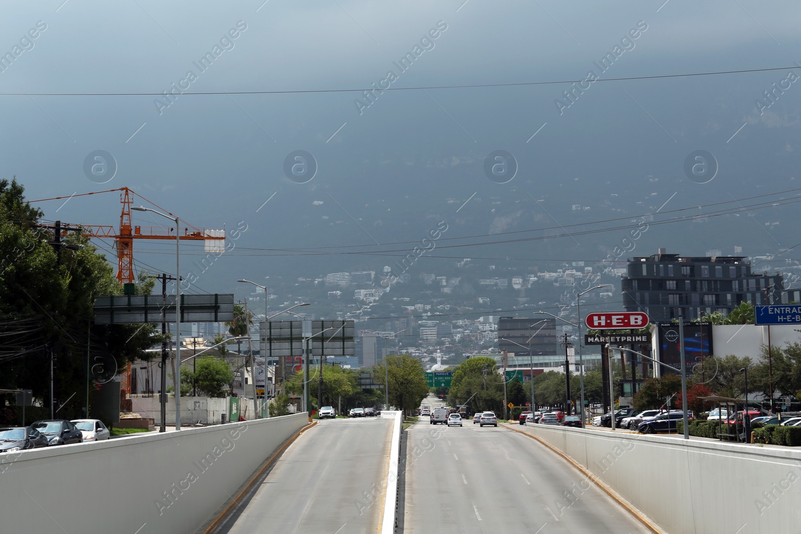 Photo of SAN PEDRO GARZA GARCIA, MEXICO - AUGUST 29, 2022: Cars in traffic jam on city street, aerial view