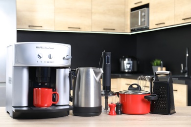 Set with modern domestic appliances in kitchen