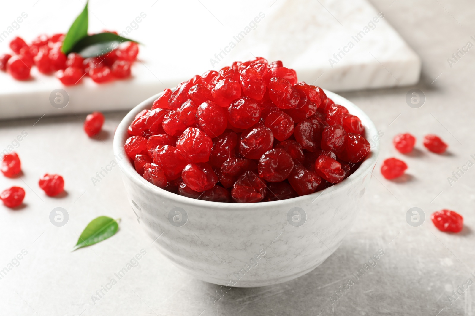 Photo of Bowl of sweet cherries on table. Dried fruit as healthy snack