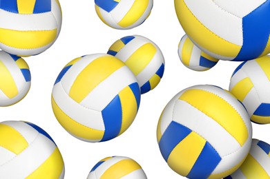 Image of Many volleyball balls falling on white background