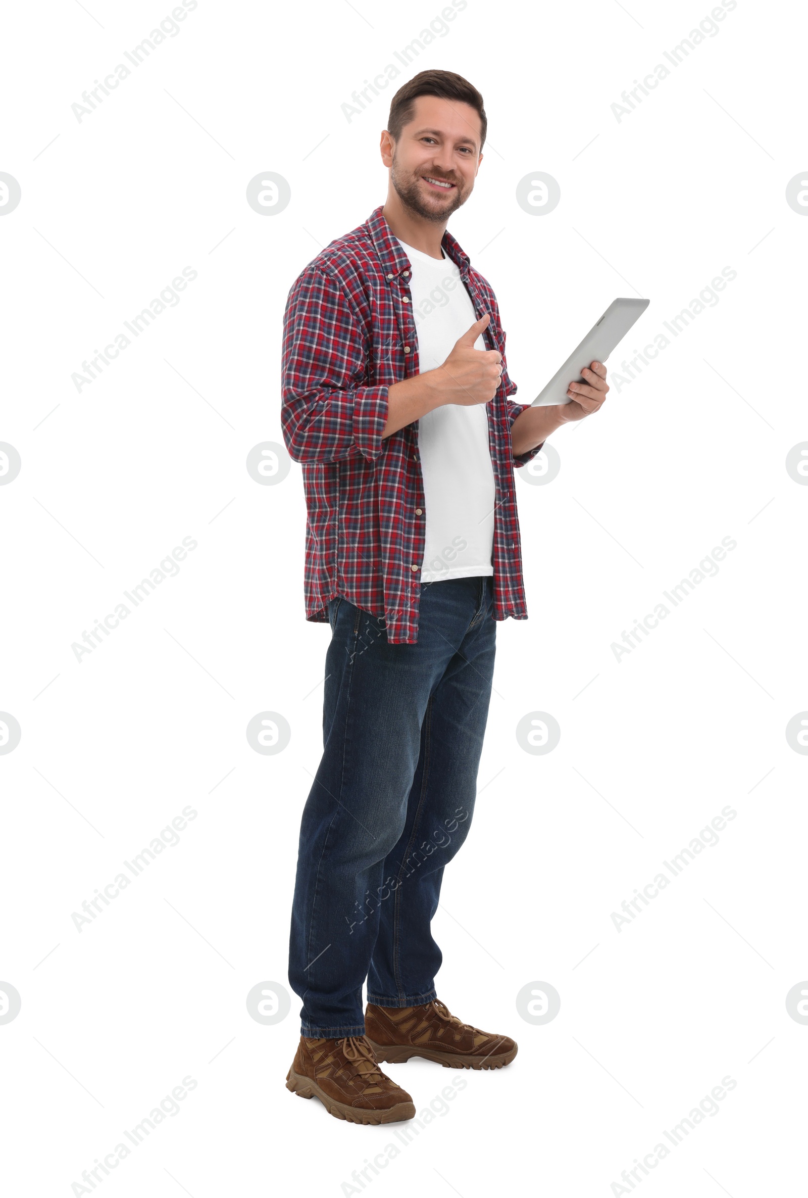 Photo of Happy man with tablet showing thumb up on white background