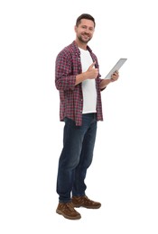 Happy man with tablet showing thumb up on white background