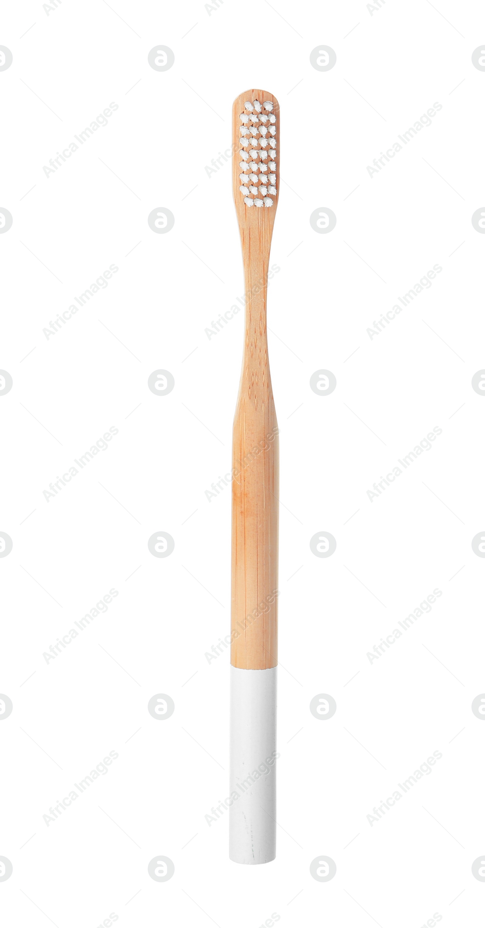 Photo of Bamboo toothbrush on white background. Dental care