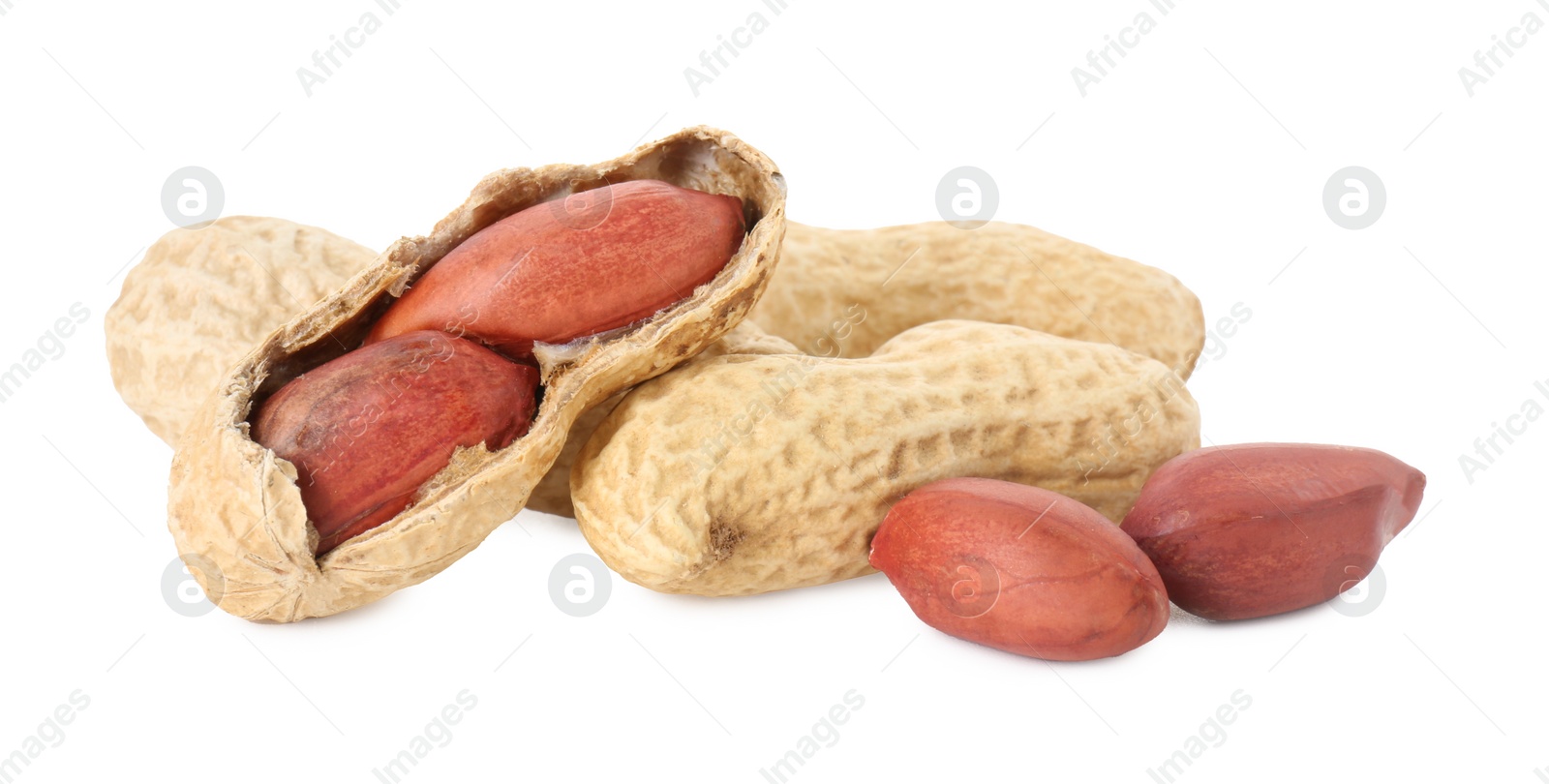 Photo of Fresh peanuts isolated on white. Healthy snack