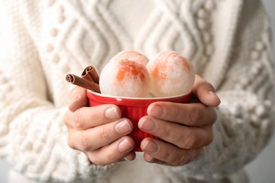 Photo of Woman with bowl of snow ice cream, closeup