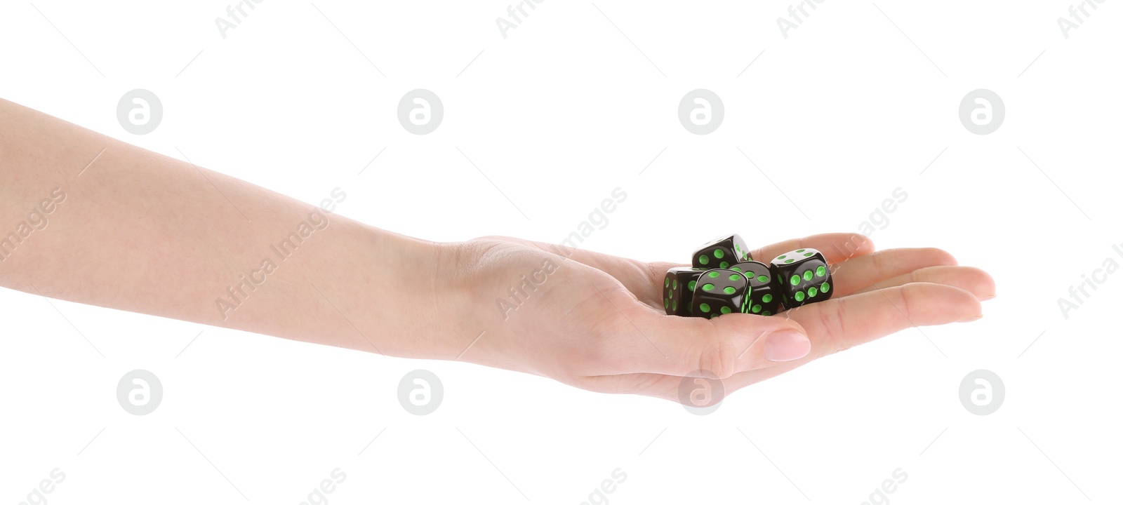 Photo of Woman throwing game dices on white background, closeup