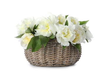 Bouquet of beautiful peonies in wicker basket isolated on white