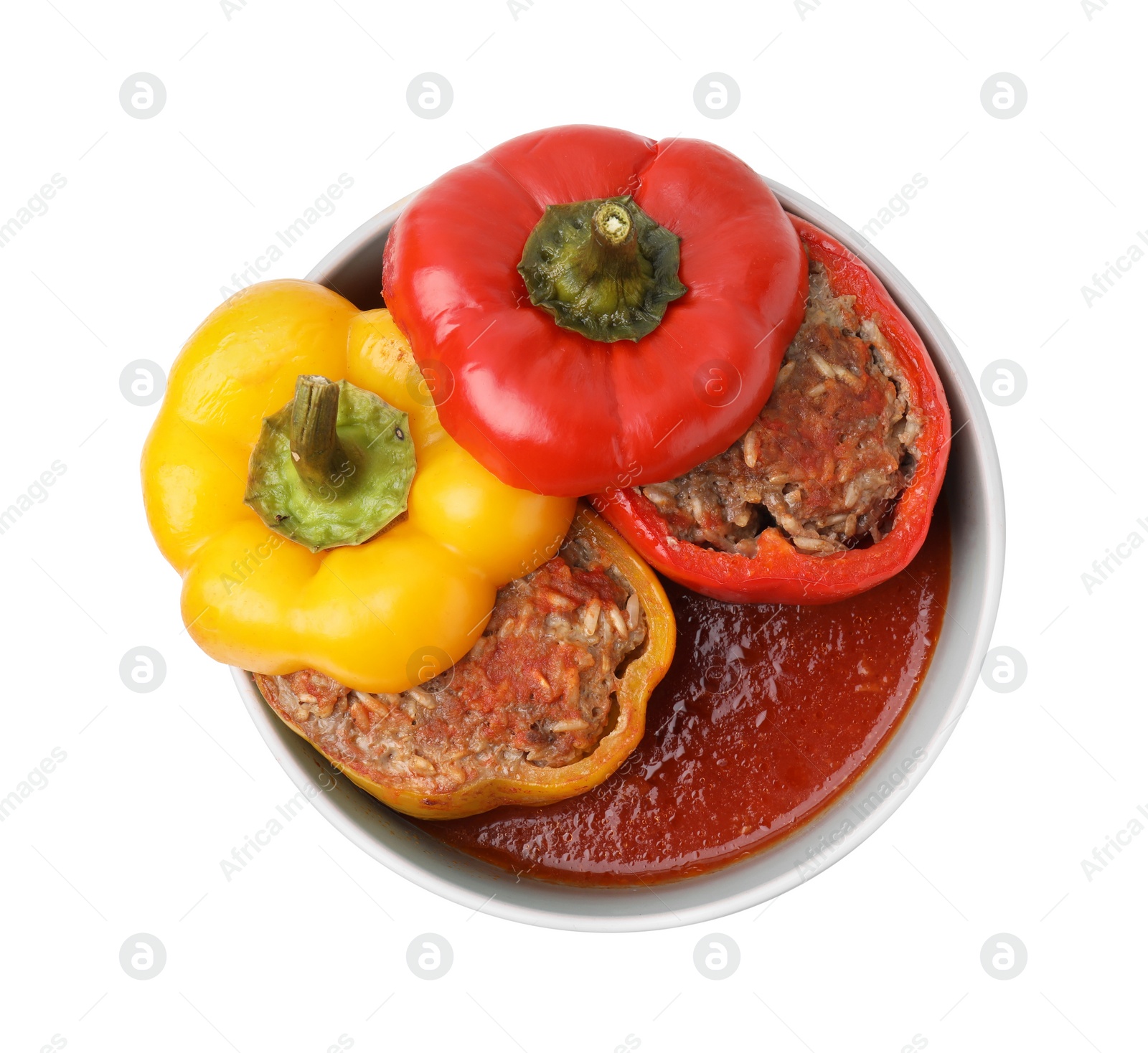 Photo of Delicious stuffed bell peppers isolated on white, top view