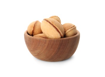 Photo of Delicious nut shaped cookies with boiled condensed milk in wooden bowl on white background