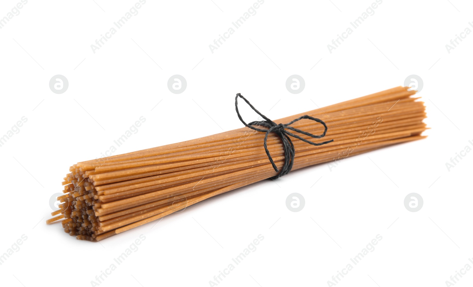 Photo of Tied uncooked buckwheat noodles isolated on white