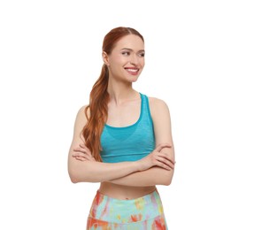 Young woman wearing sportswear on white background