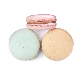 Photo of Different delicious colorful macarons on white background, top view