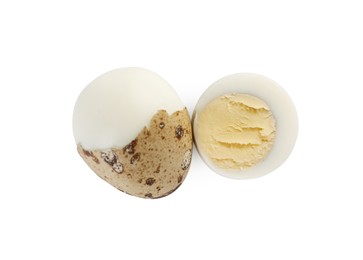 Photo of Peeled hard boiled quail egg and another one partly in shell on white background, top view