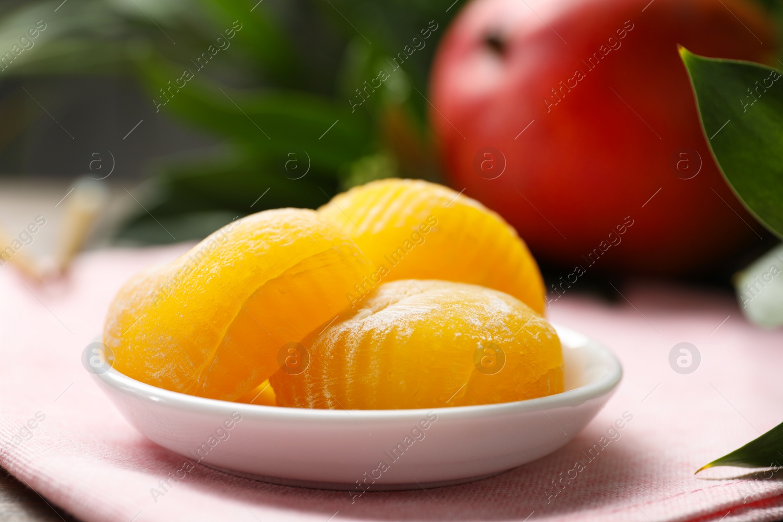 Photo of Plate with delicious mochi on table, closeup. Traditional Japanese dessert