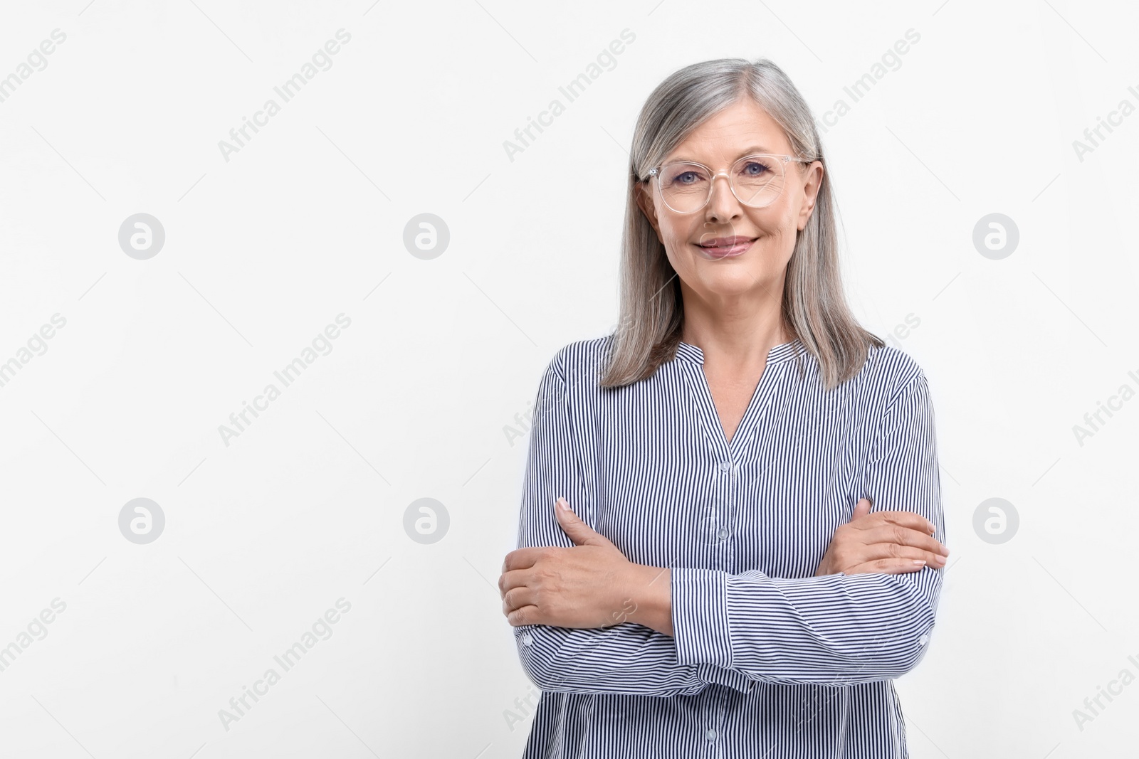 Photo of Portrait of beautiful senior woman in glasses on white background. Space for text