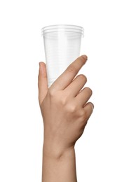 Photo of Woman holding plastic cups on white background, closeup