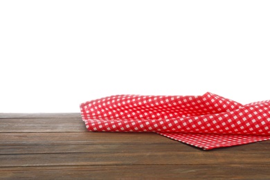 Photo of Red checkered cloth on wooden table against white background. Mockup for design