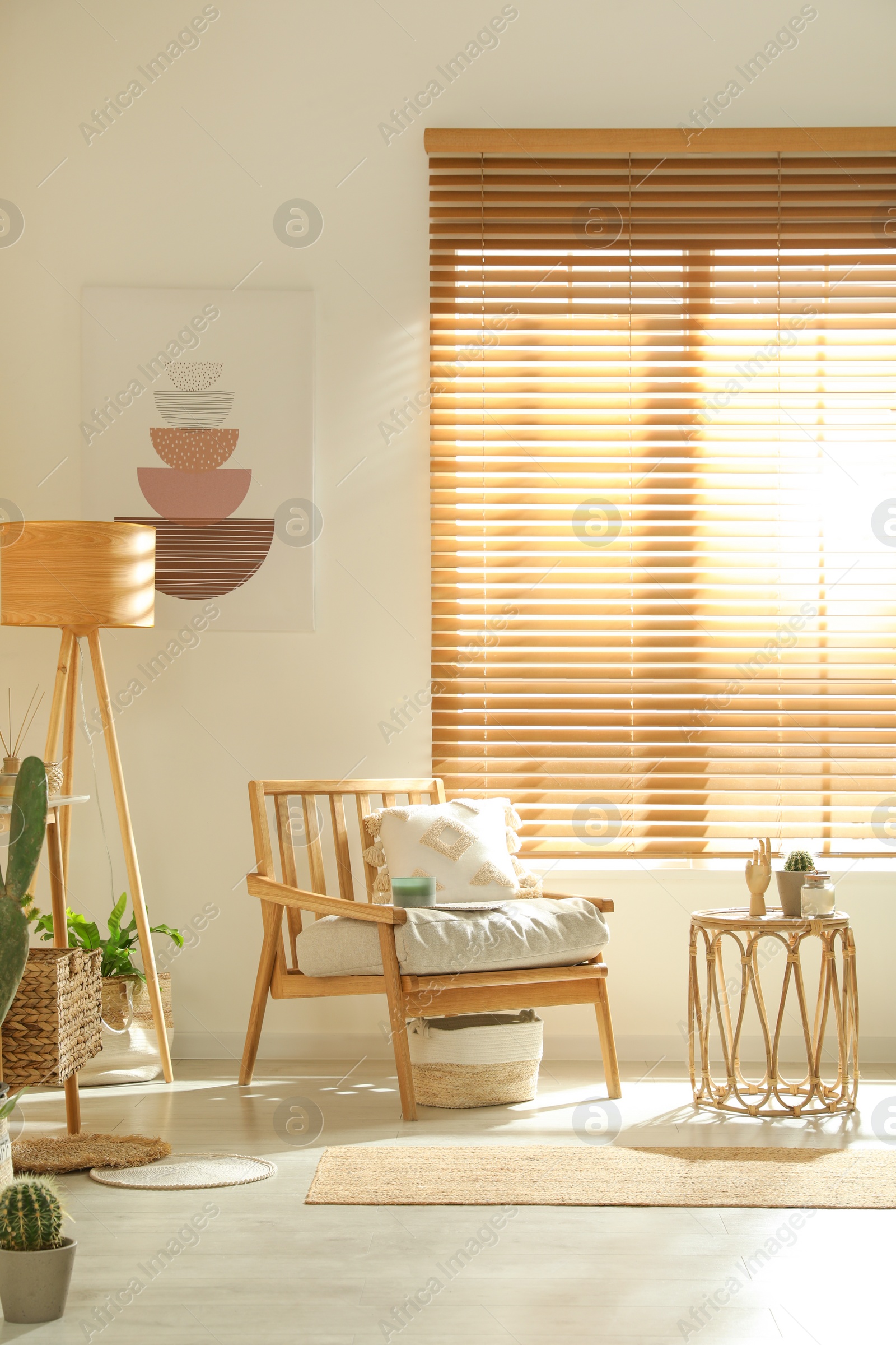 Photo of Stylish living room interior with comfortable wooden armchair