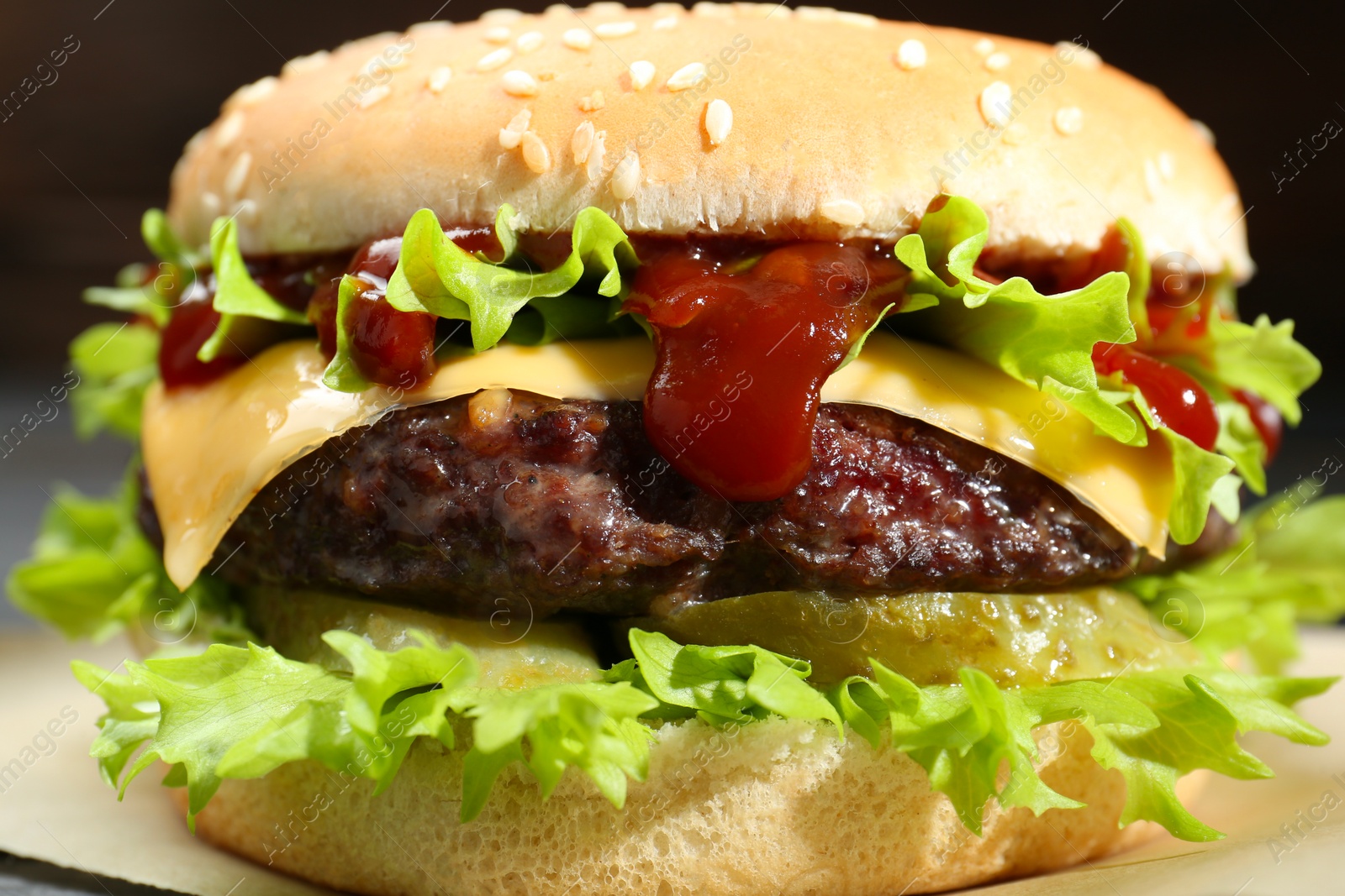 Photo of Burger with delicious patty on table, closeup