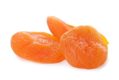 Tasty apricots on white background. Dried fruit as healthy food