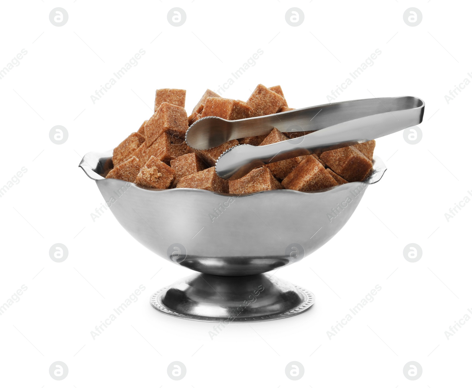 Photo of Metal bowl with brown sugar cubes and tongs isolated on white