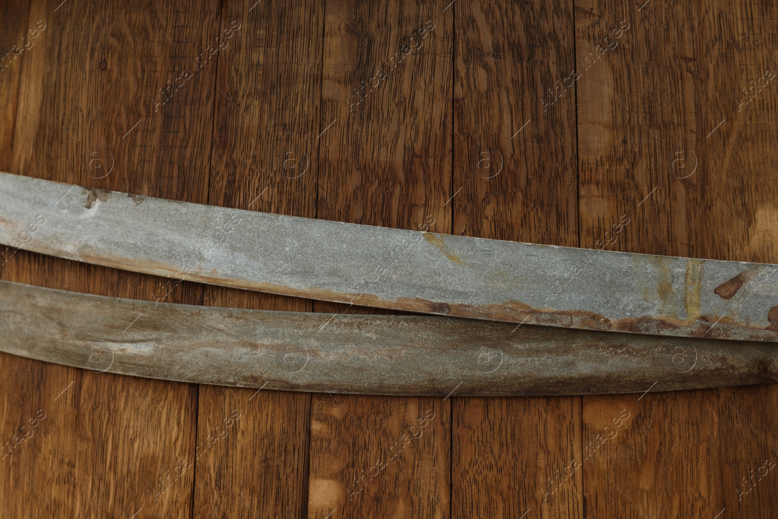 Photo of Traditional wooden barrel as background, closeup. Wine making