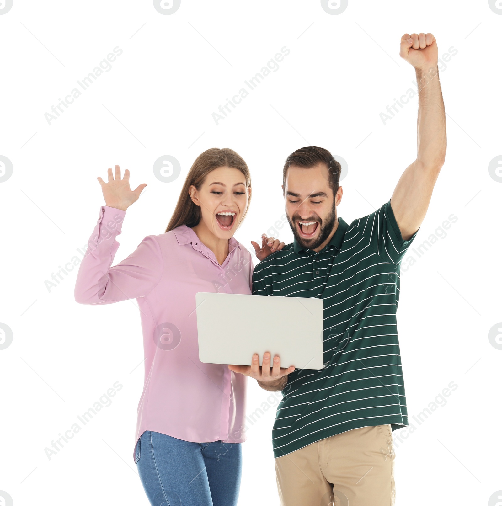 Photo of Emotional young people with laptop celebrating victory on white background