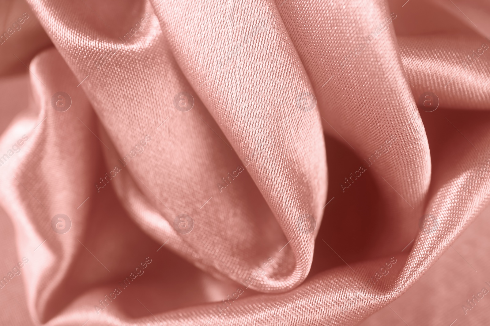 Photo of Texture of beautiful rose silk as background