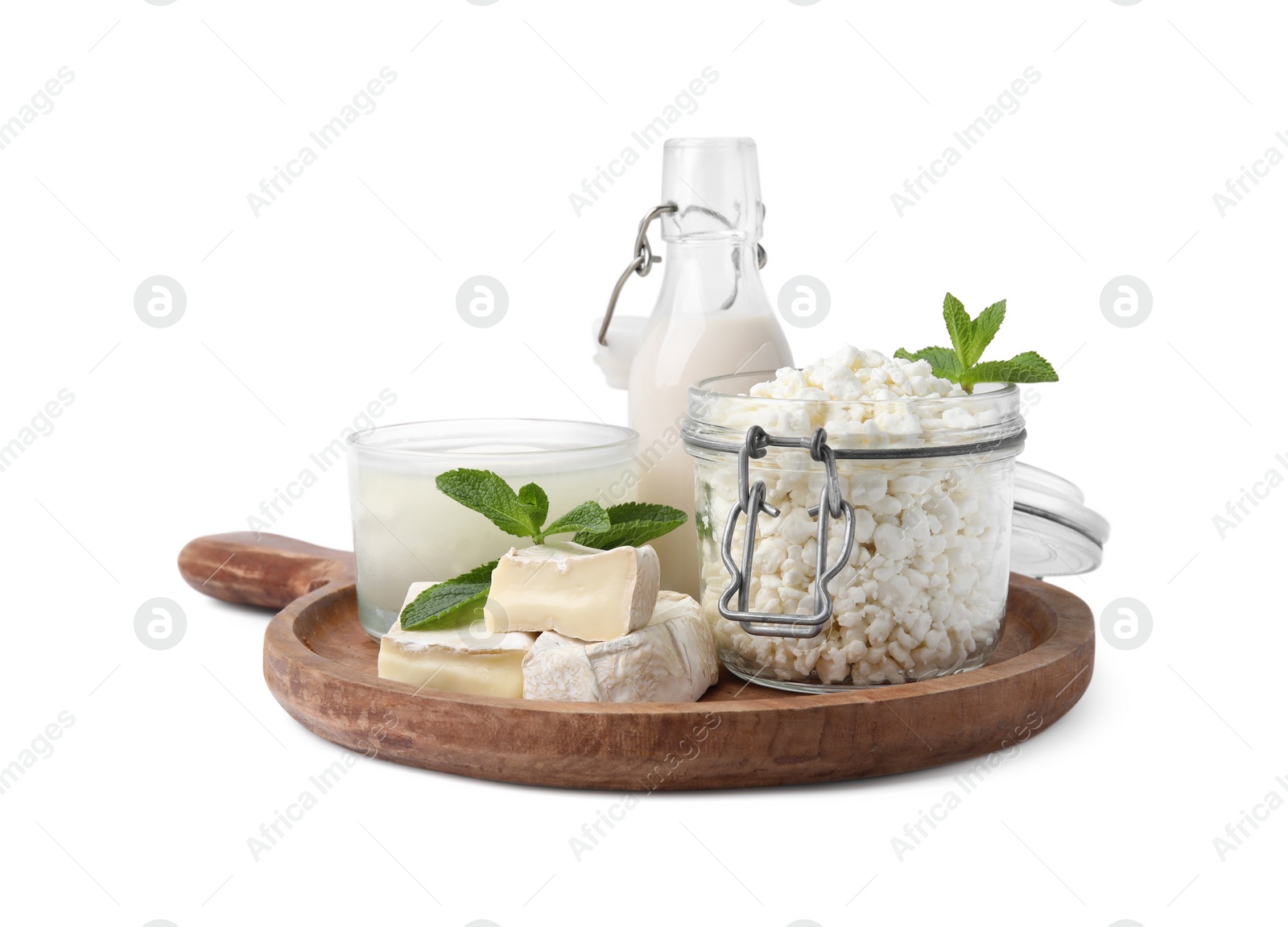 Photo of Different dairy products and mint isolated on white