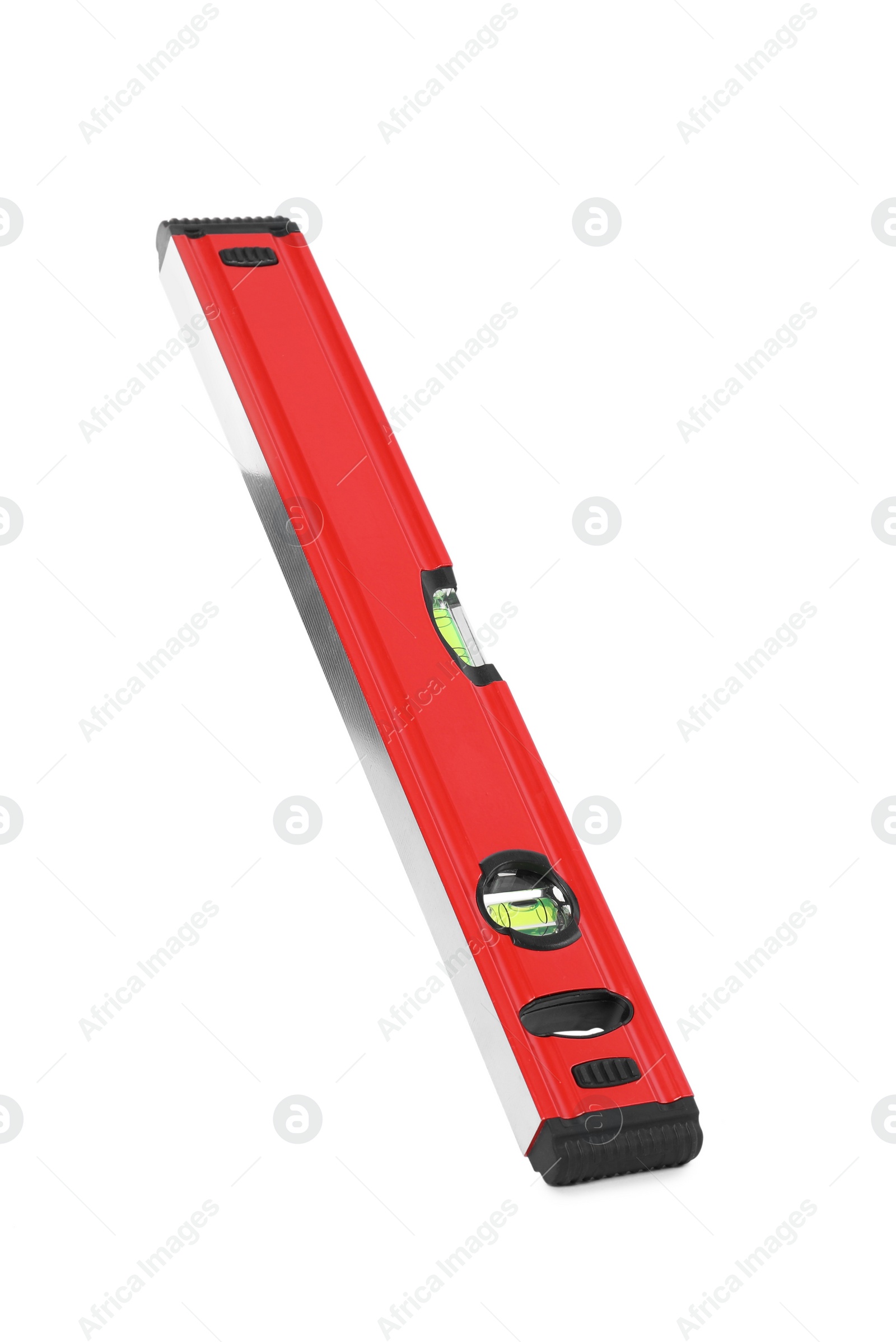 Photo of Red building level isolated on white. Construction tool