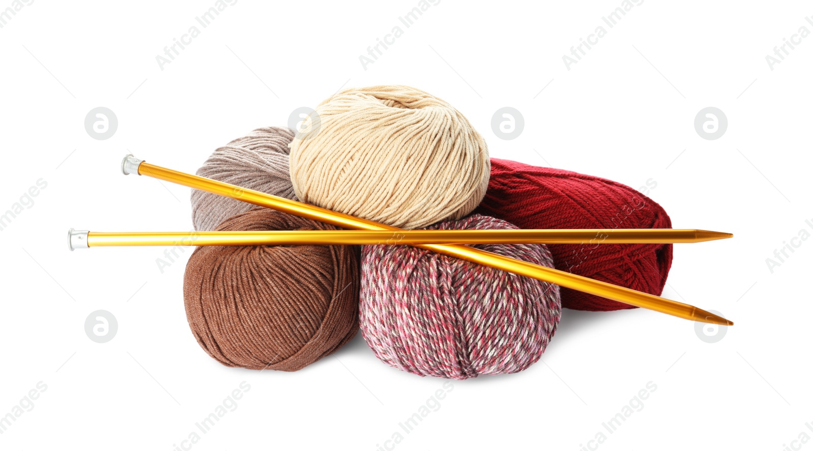 Photo of Different balls of woolen knitting yarns and needles on white background