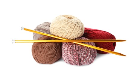 Photo of Different balls of woolen knitting yarns and needles on white background