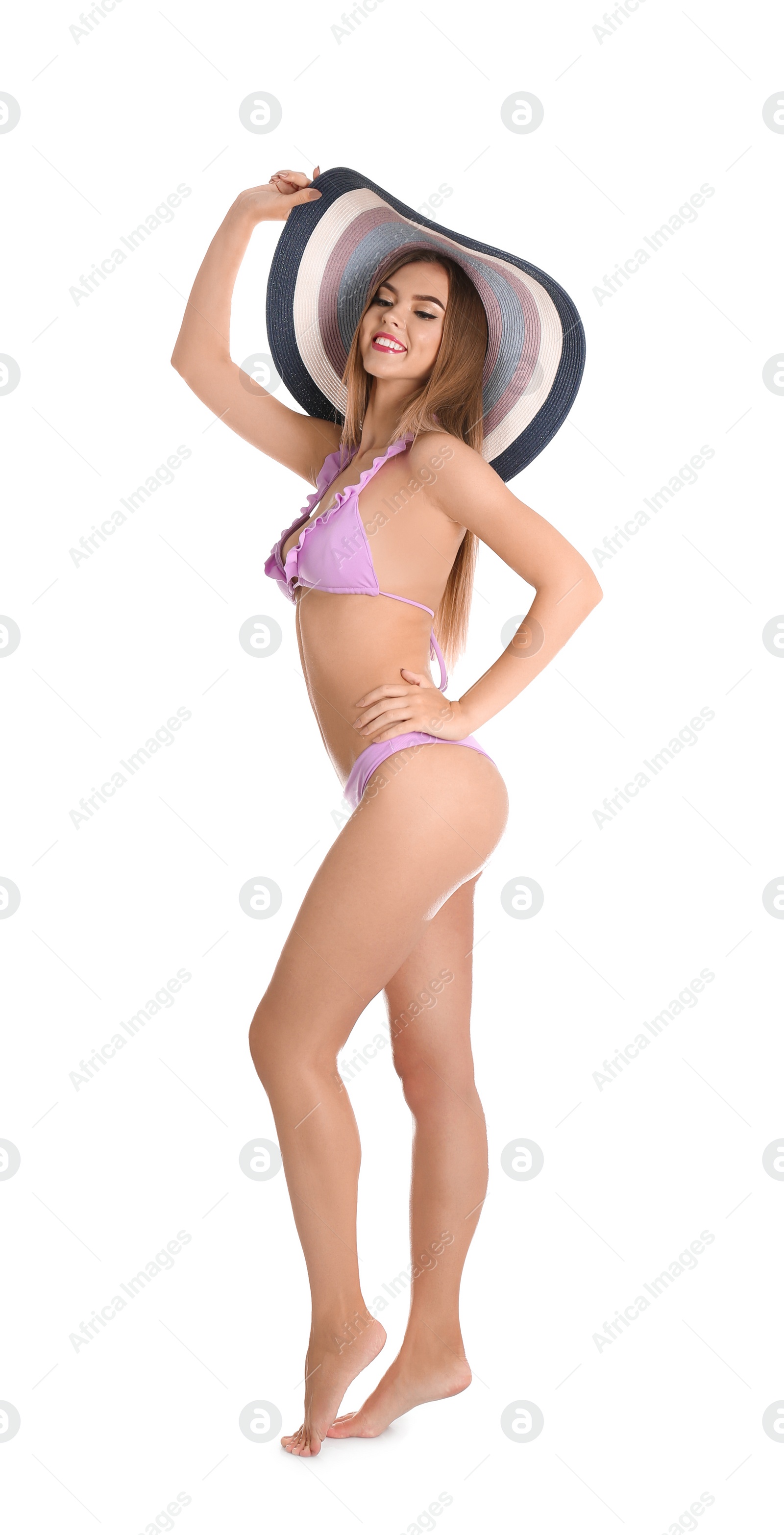 Photo of Pretty sexy woman in stylish bikini with hat on white background