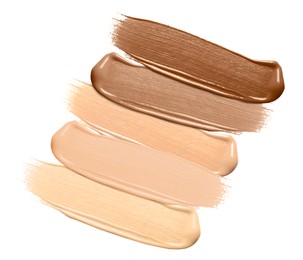 Image of Foundation of various shades for different skin tones isolated on white, top view. Set of samples