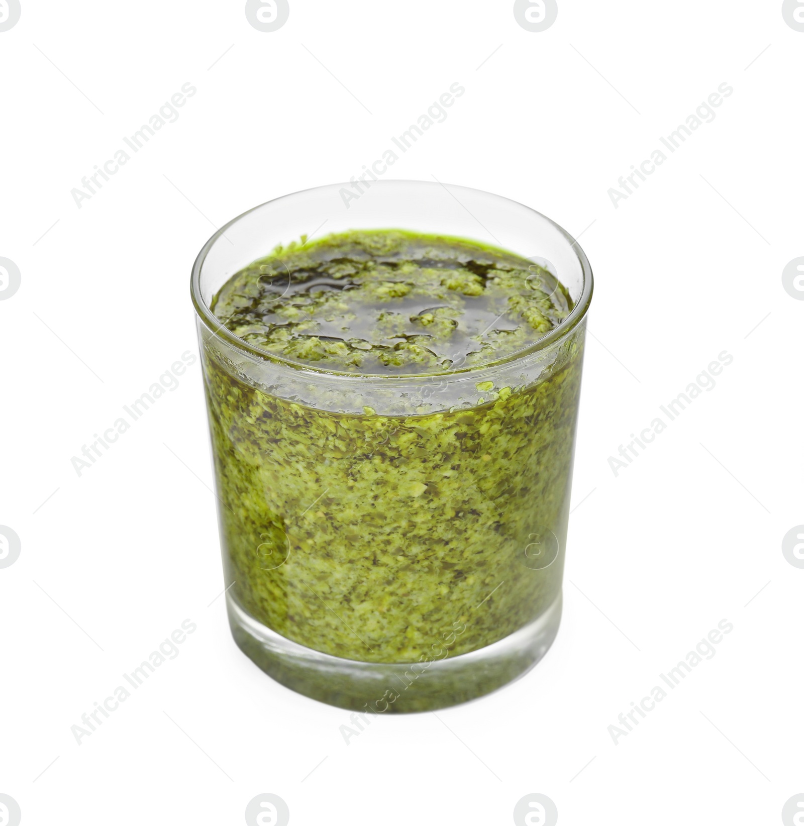 Photo of Tasty pesto sauce in glass jar isolated on white