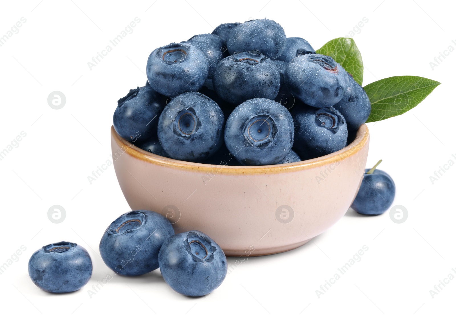 Photo of Fresh ripe blueberries and leaves isolated on white