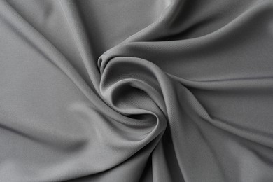 Texture of grey crumpled silk fabric as background, top view