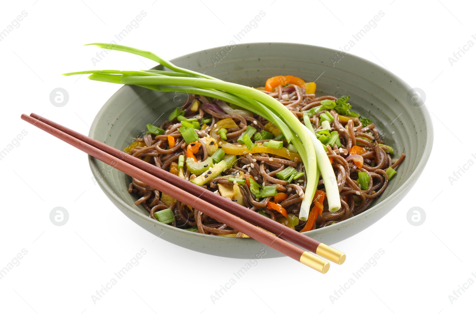 Photo of Stir-fry. Delicious cooked noodles with chicken in bowl and chopsticks isolated on white